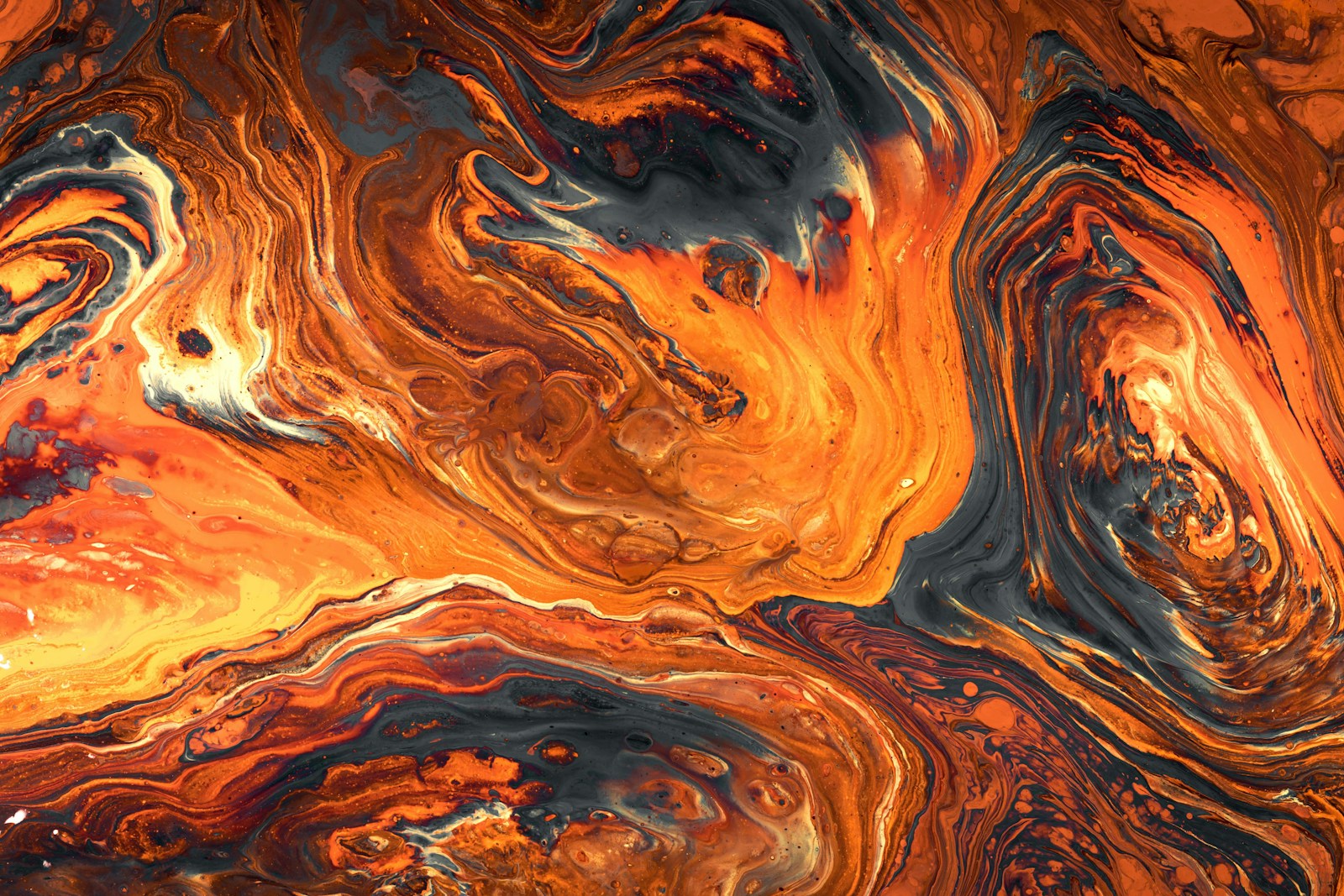 Photo by Pawel Czerwinski blue and orange abstract painting